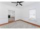 Living room with hardwood floors, fireplace, and wainscoting at 283 Boulder Park Ln, Atlanta, GA 30331