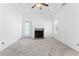 Living room with fireplace and neutral carpeting at 283 Boulder Park Ln, Atlanta, GA 30331