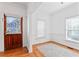 Open living area with hardwood floors and wood door at 283 Boulder Park Ln, Atlanta, GA 30331