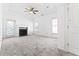 Living room with fireplace and neutral carpeting at 283 Boulder Park Ln, Atlanta, GA 30331