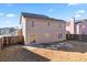 Back exterior of the house showing the backyard at 5728 Rock Shoals Way, Atlanta, GA 30349