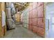 Unfinished basement with exposed framing, insulation, and HVAC systems at 210 Idylwilde Way, Canton, GA 30115