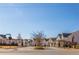 Attractive community entrance with brick pillars and lush landscaping, welcoming residents and guests at 210 Idylwilde Way, Canton, GA 30115