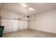 Large, clean, empty garage with automatic opener and ample space for parking and storage at 210 Idylwilde Way, Canton, GA 30115
