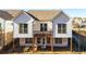 Two-story home with a deck and fenced backyard at 210 Idylwilde Way, Canton, GA 30115