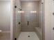 Large walk-in shower with glass enclosure and built-in seat at 210 Idylwilde Way, Canton, GA 30115