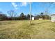 Large backyard with grassy area and shed at 740 Smith Ferguson Rd, Dallas, GA 30157