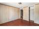 Unfinished bedroom with wood flooring and a closet at 740 Smith Ferguson Rd, Dallas, GA 30157