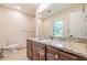 Bathroom with granite vanity and a large mirror at 2911 Bentwood Dr, Marietta, GA 30062