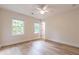 Spacious bedroom with hardwood floors and ceiling fan at 2911 Bentwood Dr, Marietta, GA 30062