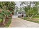 Two-story house with white siding, black shutters, and two-car garage at 2911 Bentwood Dr, Marietta, GA 30062