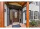 Inviting front door with brick walkway and wood accents at 2911 Bentwood Dr, Marietta, GA 30062