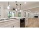 Modern kitchen island with quartz countertops and black appliances at 2911 Bentwood Dr, Marietta, GA 30062