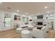 Bright living room with fireplace, built-ins, and hardwood floors at 2911 Bentwood Dr, Marietta, GA 30062