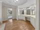 Spacious bathroom features ample counter space with a large mirror, designed for comfort and functionality at 3714 Thunder Ne Way, Marietta, GA 30066