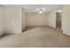 Spacious bedroom with neutral carpet, ceiling fan, and an open closet provides ample room at 3714 Thunder Ne Way, Marietta, GA 30066