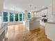 Spacious kitchen with a large island, stainless steel appliances, and bright windows at 3714 Thunder Ne Way, Marietta, GA 30066
