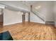 Open-concept living room with soaring ceilings, hardwood floors, and a staircase at 3714 Thunder Ne Way, Marietta, GA 30066