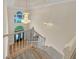 Grand foyer showcases a beautiful chandelier and staircase leading to the upper level of the home at 3714 Thunder Ne Way, Marietta, GA 30066