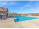 Community pool with expansive deck and covered seating area at 7350 Rambling Vale, Cumming, GA 30028