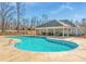 Community pool with adjacent clubhouse at 7350 Rambling Vale, Cumming, GA 30028