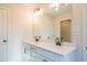 Modern bathroom with double vanity and a large mirror at 147 Bluffington Way, Marietta, GA 30066