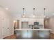 Modern kitchen with island, stainless steel appliances, and white cabinets at 147 Bluffington Way, Marietta, GA 30066