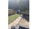 Backyard with storage shed and walkway at 1682 Connally Dr, Atlanta, GA 30344