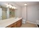 Bathroom with double vanity and toilet at 3054 Chelsea Ln, Acworth, GA 30102