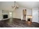 Spacious living room with hardwood floors and a fireplace at 3054 Chelsea Ln, Acworth, GA 30102