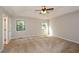 Spacious main bedroom with carpet and ceiling fan at 3054 Chelsea Ln, Acworth, GA 30102