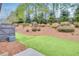 Private backyard with grassy area and wooden fence at 5760 Vista Brook Dr, Suwanee, GA 30024