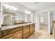 Large bathroom with double vanity and marble countertop at 5760 Vista Brook Dr, Suwanee, GA 30024