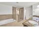 Bathroom with soaking tub and walk-in shower at 5760 Vista Brook Dr, Suwanee, GA 30024