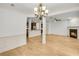 Bright dining room with hardwood floors and a chandelier at 5760 Vista Brook Dr, Suwanee, GA 30024