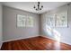 Well-lit bedroom with hardwood floors and neutral walls at 1863 Derrill Dr, Decatur, GA 30032