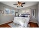 Spacious bedroom with hardwood floors and a ceiling fan at 1863 Derrill Dr, Decatur, GA 30032