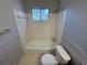 Clean bathroom featuring a bathtub, toilet, and shower at 2534 Sharpsburg Ct, Decatur, GA 30034