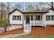 Newly renovated home with a front porch and yard at 170 Remington Ln, Acworth, GA 30101