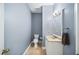 Small powder room with updated vanity and tile flooring at 2865 Lenox Ne Rd # 208, Atlanta, GA 30324