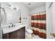 Clean bathroom with a tub shower, vanity, and toilet at 2865 Lenox Ne Rd # 208, Atlanta, GA 30324