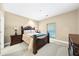 Comfortable bedroom with carpeted floors and en-suite bathroom access at 2865 Lenox Ne Rd # 208, Atlanta, GA 30324