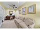 Bright home office featuring a comfortable sofa and built-in desk at 2865 Lenox Ne Rd # 208, Atlanta, GA 30324