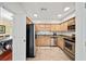 Well-equipped kitchen with granite countertops and stainless steel appliances at 2865 Lenox Ne Rd # 208, Atlanta, GA 30324