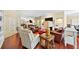 Living room with hardwood floors, comfortable seating, and built-in shelving at 2865 Lenox Ne Rd # 208, Atlanta, GA 30324