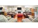 Elegant living room with hardwood floors, fireplace, and ample seating at 2865 Lenox Ne Rd # 208, Atlanta, GA 30324