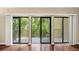Living room with sliding glass doors leading to a balcony at 2865 Lenox Ne Rd # 208, Atlanta, GA 30324