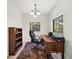 Spacious home office features a large desk and ample natural light at 2865 Lenox Ne Rd # 208, Atlanta, GA 30324