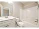 Bathroom featuring a shower-tub combo and stylish vanity at 2571 Se Ebenezer Rd, Conyers, GA 30094