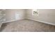 Walk-in closet with neutral carpet, wire shelving, and access door at 2571 Se Ebenezer Rd, Conyers, GA 30094